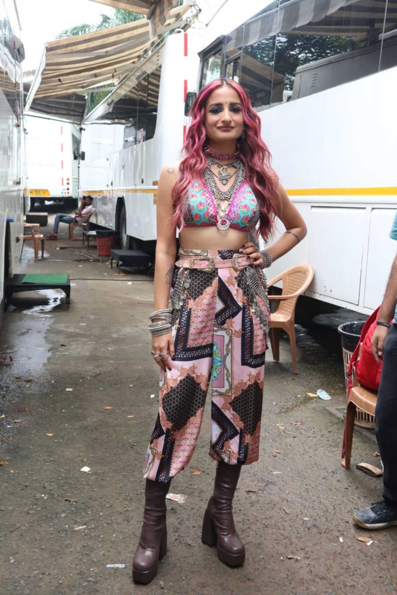 The singer wore a multicoloured abstract print outfit